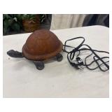 Amber art glass turtle accent lamp featuring a
