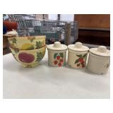 Set of three ceramic kitchen canisters with