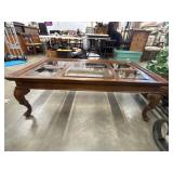 Vintage rectangular wood coffee table featuring a