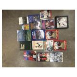 Collection of sports-themed books, programs, and