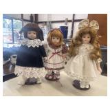 3  Vintage porcelain collector dolls.