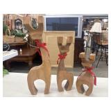 Set of three handmade, wooden reindeer figurines