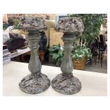 2 Rustic resin pillar candle holders featuring an