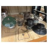 Bundle of Coleman lantern replacement parts. A