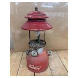 Vintage red Coleman Model 200A single-mantel gas
