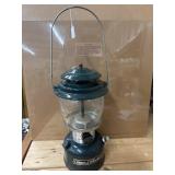 Vintage green Coleman liquid-fuel lantern Model