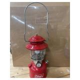 Vintage red Coleman Model 200A single-mantle
