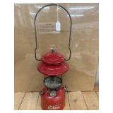 Vintage red Coleman Model 200A Lantern featuring