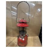 Vintage red Coleman Model 200A single-mantle