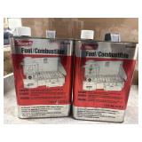 2 1-gallon metal cans of Coleman Liquid Fuel.