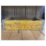 Vintage yellow and red wooden Coca-Cola soda