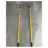 2 yelow handle Garden rakes.