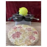 9 pc. Braided place mats, silicone strainer