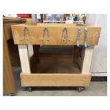 Custom-built, wooden rolling workshop cart