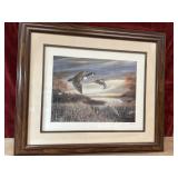 Framed  print appears to be "Migration South" by