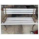 Vintage outdoor garden bench with white wooden
