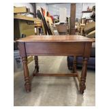 Vintage wooden side table featuring classic