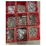 Red plastic storage bins filled with various