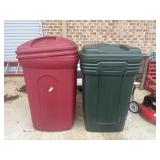 2 Heavy-duty plastic outdoor trash cans, filled