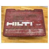 Red Hilti DX350 piston drive tool inside a
