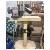 Vintage bench grinder mounted on a custom or
