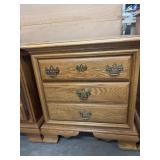 Vintage golden oak three-drawer nightstand
