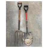 Wooden-handled 4-tine garden spading fork next to