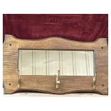Vintage wood-framed wall mirror