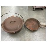 2 pc. vintage cast iron Dutch oven and skillet