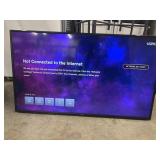 Vizio black flat-screen television.