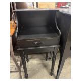 Vintage black-painted phone desk.
