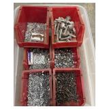 Tote full of assorted metal hardware, including