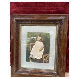 carved wooden frame.