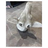 Rustic plaster concrete-style cow head wall
