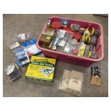 Pink plastic caddy filled with various