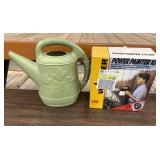 Light green plastic two-gallon watering can,