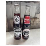 2 Vintage commemorative Coca-Cola glass bottles: