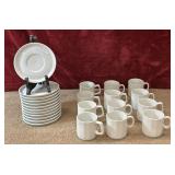 24 pc. coffee saucers and faceted coffee cups.