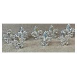 8 pc. Fleur De Lis Napkin Rings.