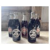 5 Vintage, 10-fluid-ounce Coca-Cola commemorative