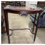 Vintage half-moon console/side table with a rich