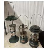 Vintage green Coleman lanterns, a propane model