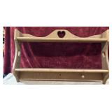 Wooden wall-mounted display shelf. Used . Sold as