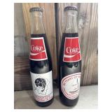 2 Vintage commemorative Coca-Cola glass bottles,