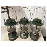 Green Coleman dual-mantle camping lantern.