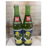 "Vintage Lot of 2" 7UP bottles.