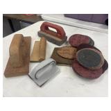 Collection of masonry and drywall hand tools,