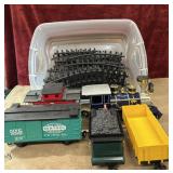 Toy  train cars  and railroad  tracks.