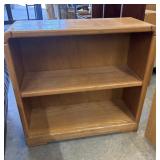 Vintage low-profile wooden bookcase.