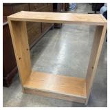 Open-sided light oak Book shelf.